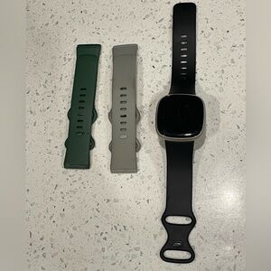 Fitbit Versa 3 Smartwatch with Black, Gray, and Green Bands